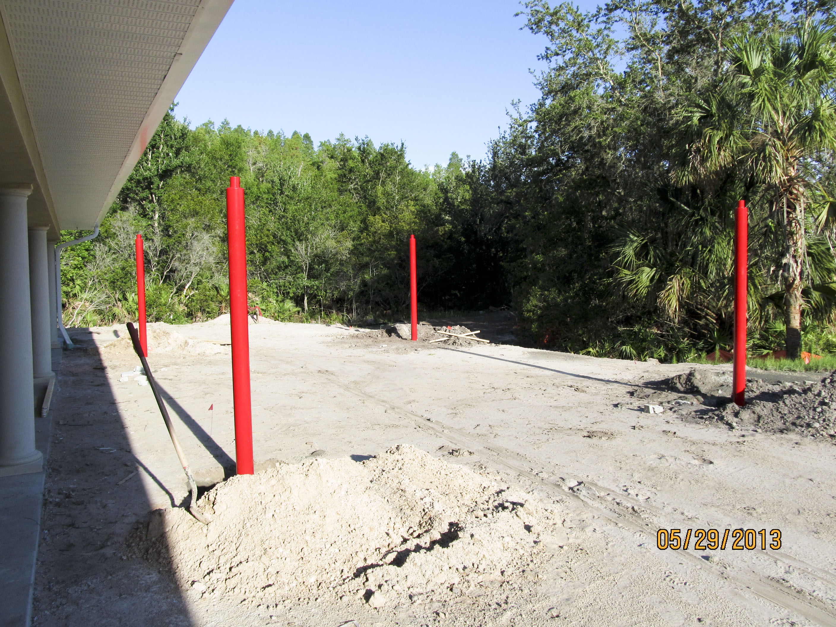    Posts are placed for the playground awning. 