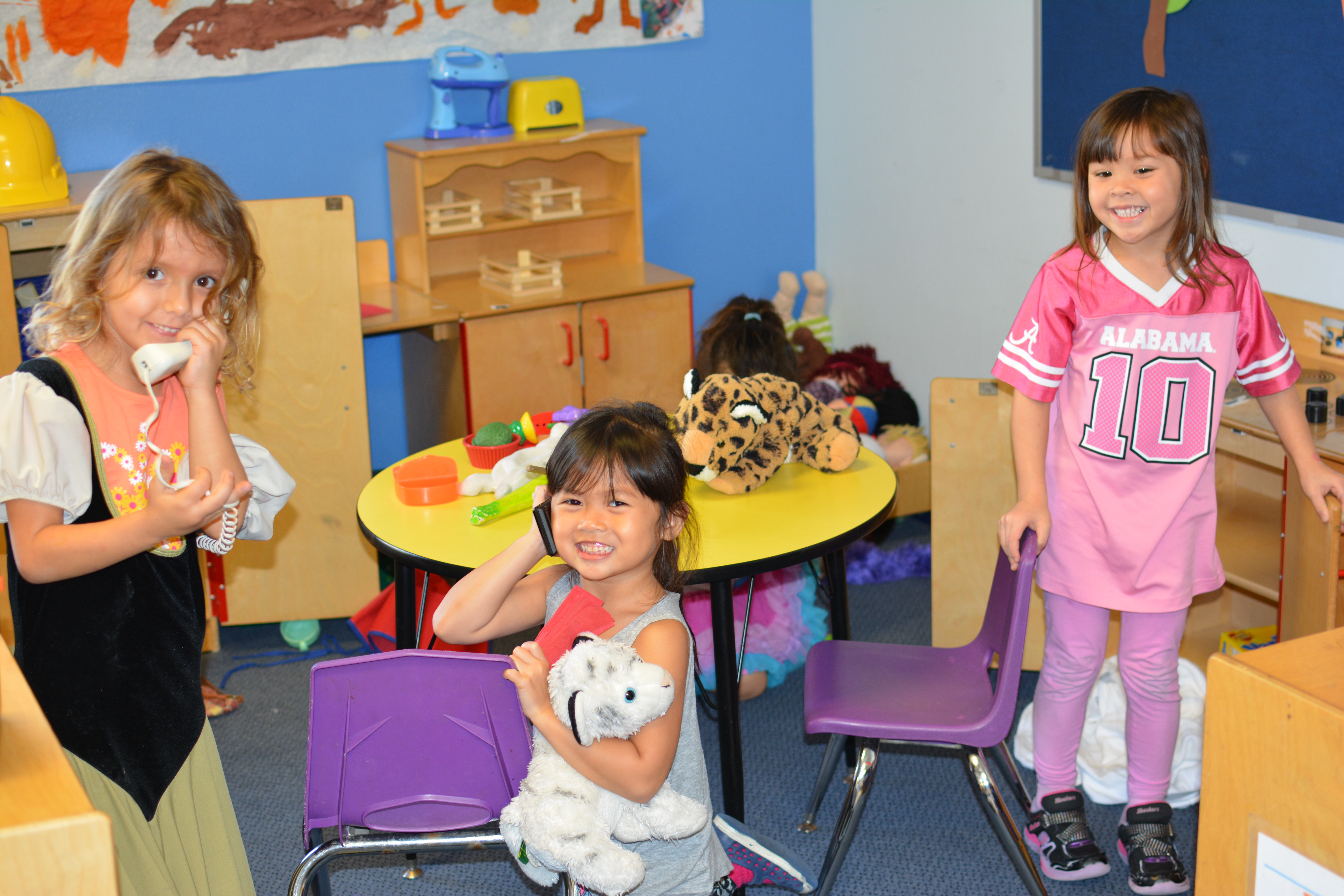 Three girls dramatic play