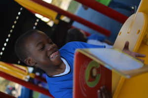 young boy reading