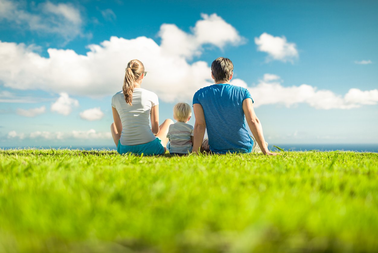 Family Sitting Outside