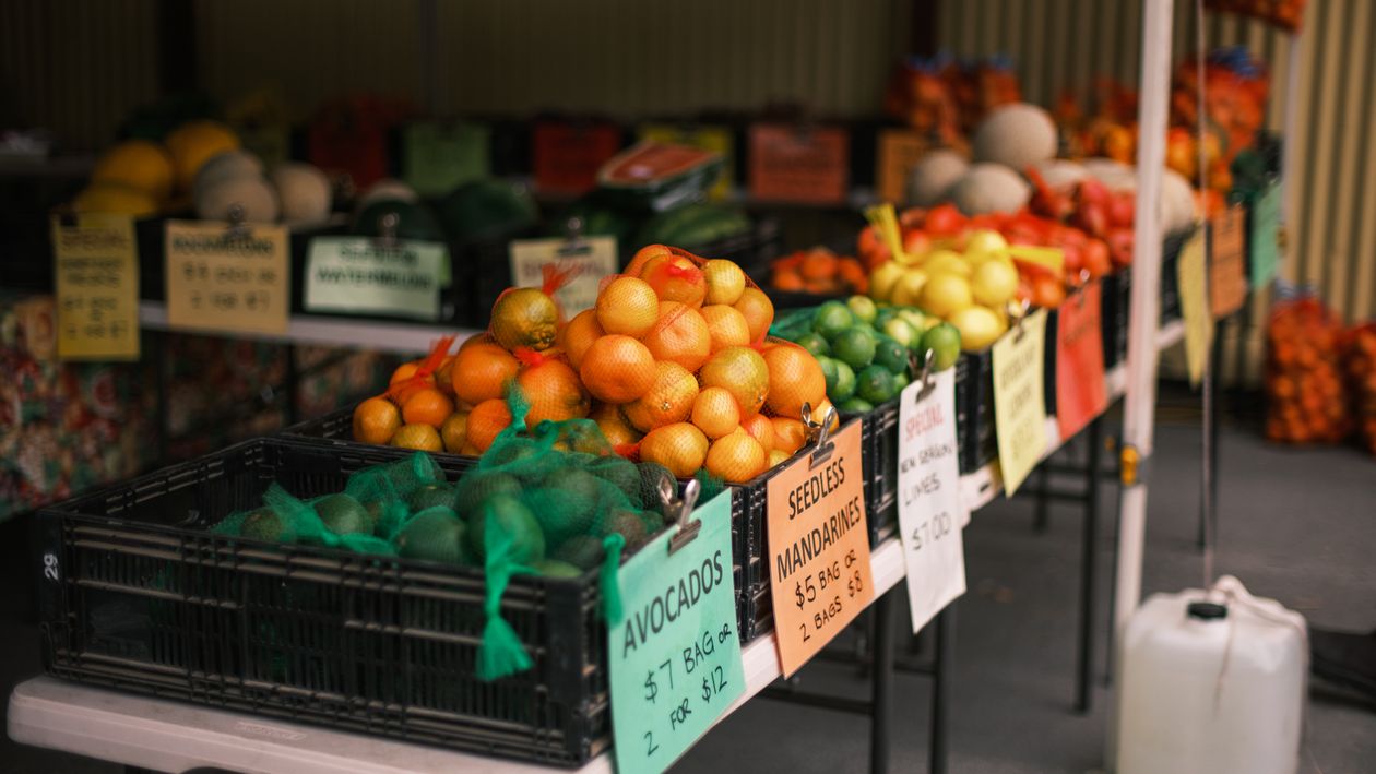 Vibrant farmers market citrus display